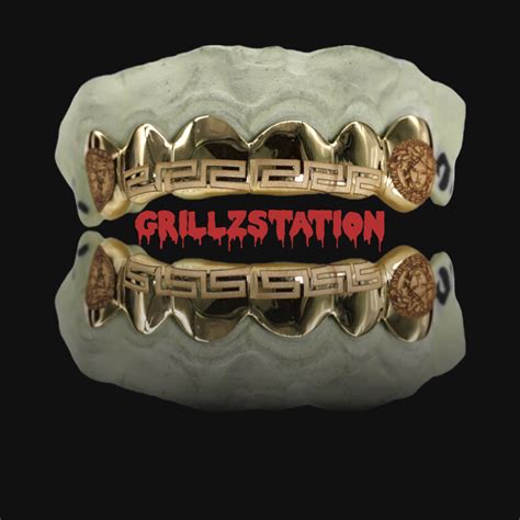 Custom Grillz Versace bar and medusa face fangs